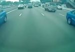 Biker knocked under a truck and crushed 2