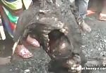African tribe girl eating raw rotten human corpse 1