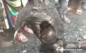 African tribe girl eating raw rotten human corpse 2