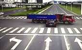 Car runs red light and slams into truck 19