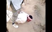 Beheading a man in a savage way 4