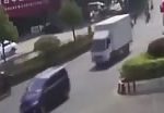 Car gets crushed between 2 cement trucks 1