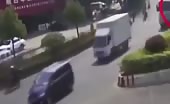 Car gets crushed between 2 cement trucks 13