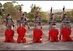 Isis children executing prisoners 2