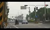Motorcyclist ignores the speeding car and pays the price 6