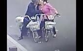 Two old asian lovers on the road 1