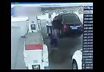 Idiot burned by fire when spaying fuel at gas station guy 2