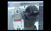 Idiot burned by fire when spaying fuel at gas station guy 5