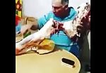 Crazy russian guy eating raw meat from cow leg 2