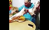 Crazy russian guy eating raw meat from cow leg 1