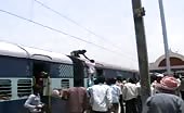 Indian local man grabs the power cables of the train 1