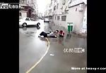 Chinese man beats his wife in front of their child 1