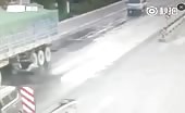 Guy on scooter gets splatted by truck 1