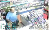 Armed robber in shop 9