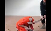 Isis beheading- head hanging by skin 2