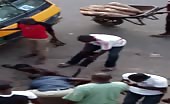 Thief being dealt with by a mob in lagos 2
