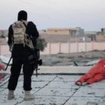 ISIS shot head of 2 guys 1
