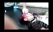 Dead child with exploded head (graphic warning) 1