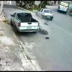A pedestrian almost smashed by a flying motorcyclist hit by a car 1