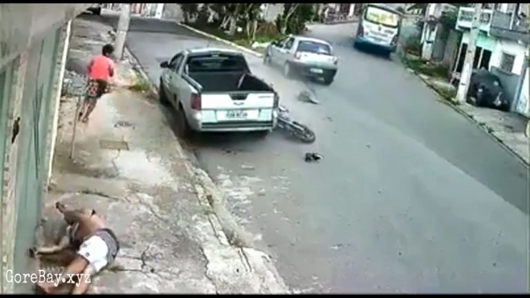 A pedestrian almost smashed by a flying motorcyclist hit by a car 24