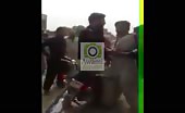 Pakistani police beating brother and sister in riot 14