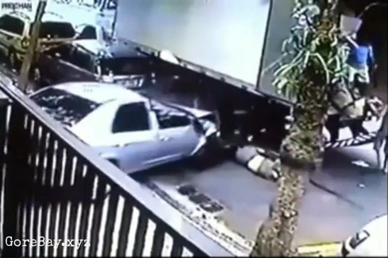 Worker crushed under a truck by a speeding car 18
