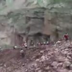 Big pieces of rocks fall onto group of people 2