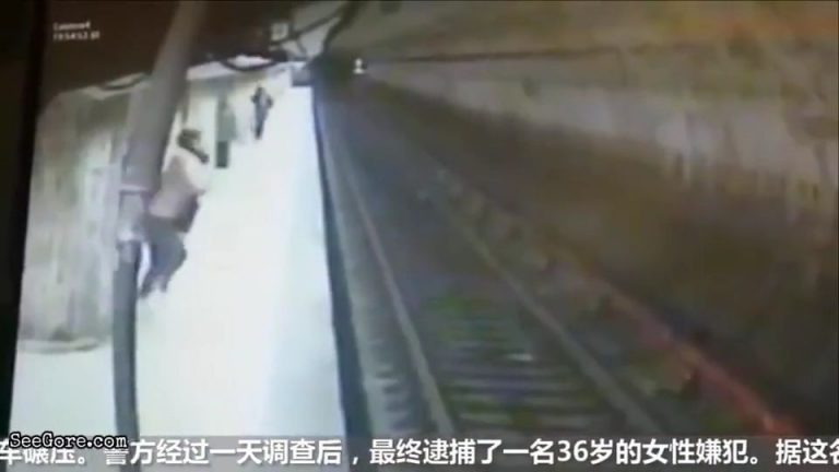 Woman pushes another woman onto train track as the train arriving 14