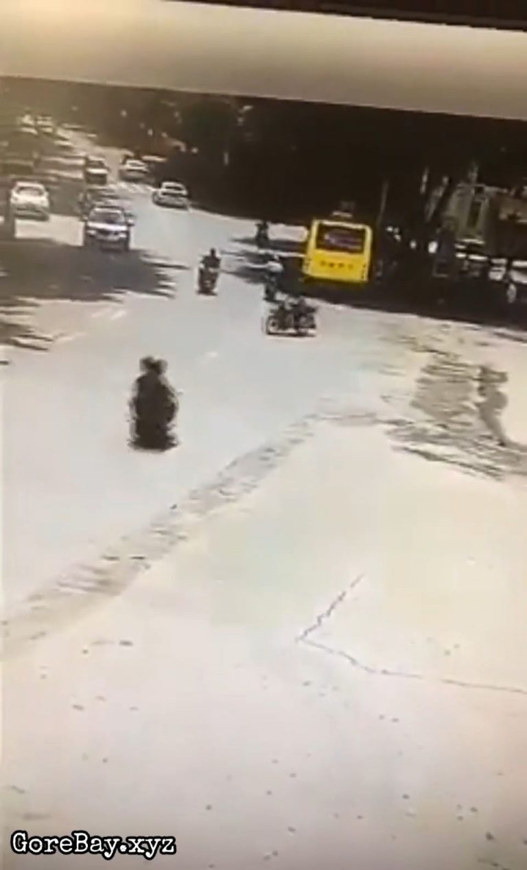 Scooter bumps into a bike and slams a bus 24