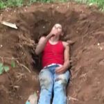 Man brutally decapitated after was forced to dig his own grave 2