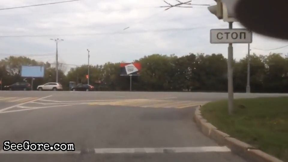 Biker slides, bumps the curb, then bounces 21