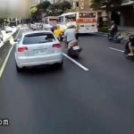 Scooter rider bumps into a taxi 2