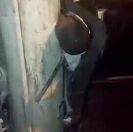 Man stuck between his car and a pole making weird noise 5
