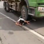 Woman stuck under a truck wheel 4