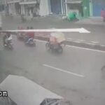 Biker slides under a truck, but escaped death 2