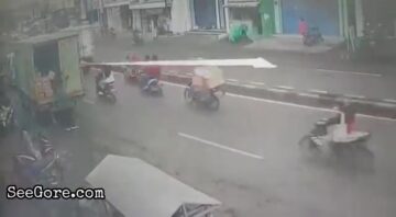 Biker slides under a truck, but escaped death 7