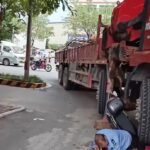 Man stuck under a heavy truck 3