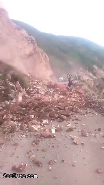 Landslide swipes a woman away 8