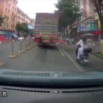 Biker crushed by a truck 1