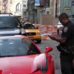 Ferrari owner drives over police officer's foot and gets arrested 2