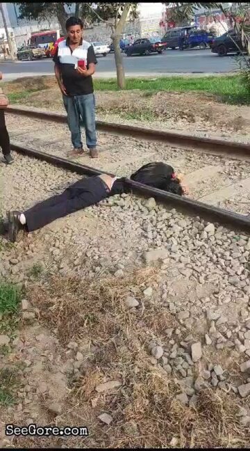 Man cut in half on train rail 4
