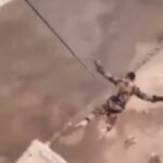 Army jumps and lands on concrete 1