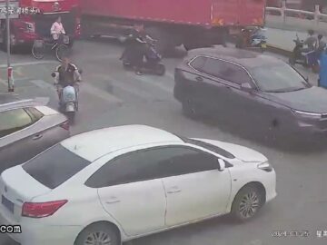 Cyclist ran over by a truck, followed by a car 6
