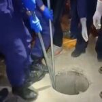 Bloated man pulled out from a hole 2