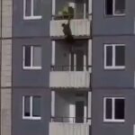 Man climbs down like Spider-Man and falls 2