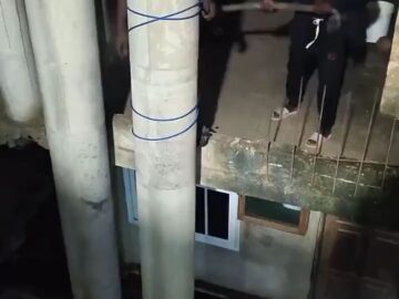 Man Tied to a Pillar and Hit With a Big Ass Pipe 7