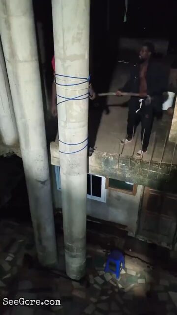 Man Tied to a Pillar and Hit With a Big Ass Pipe 1