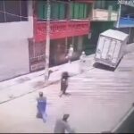 Robber Pinned Under a Truck 1