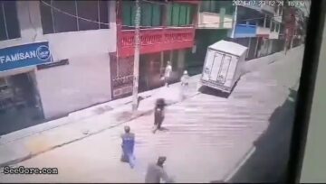 Robber Pinned Under a Truck 12