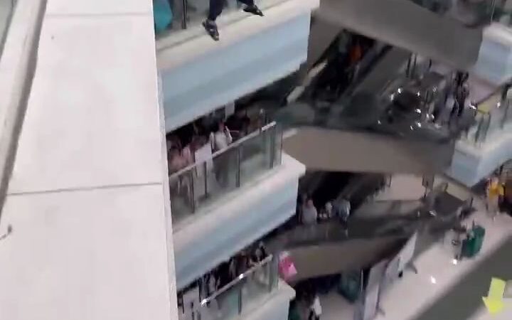 Man Jumps Off in a Mall